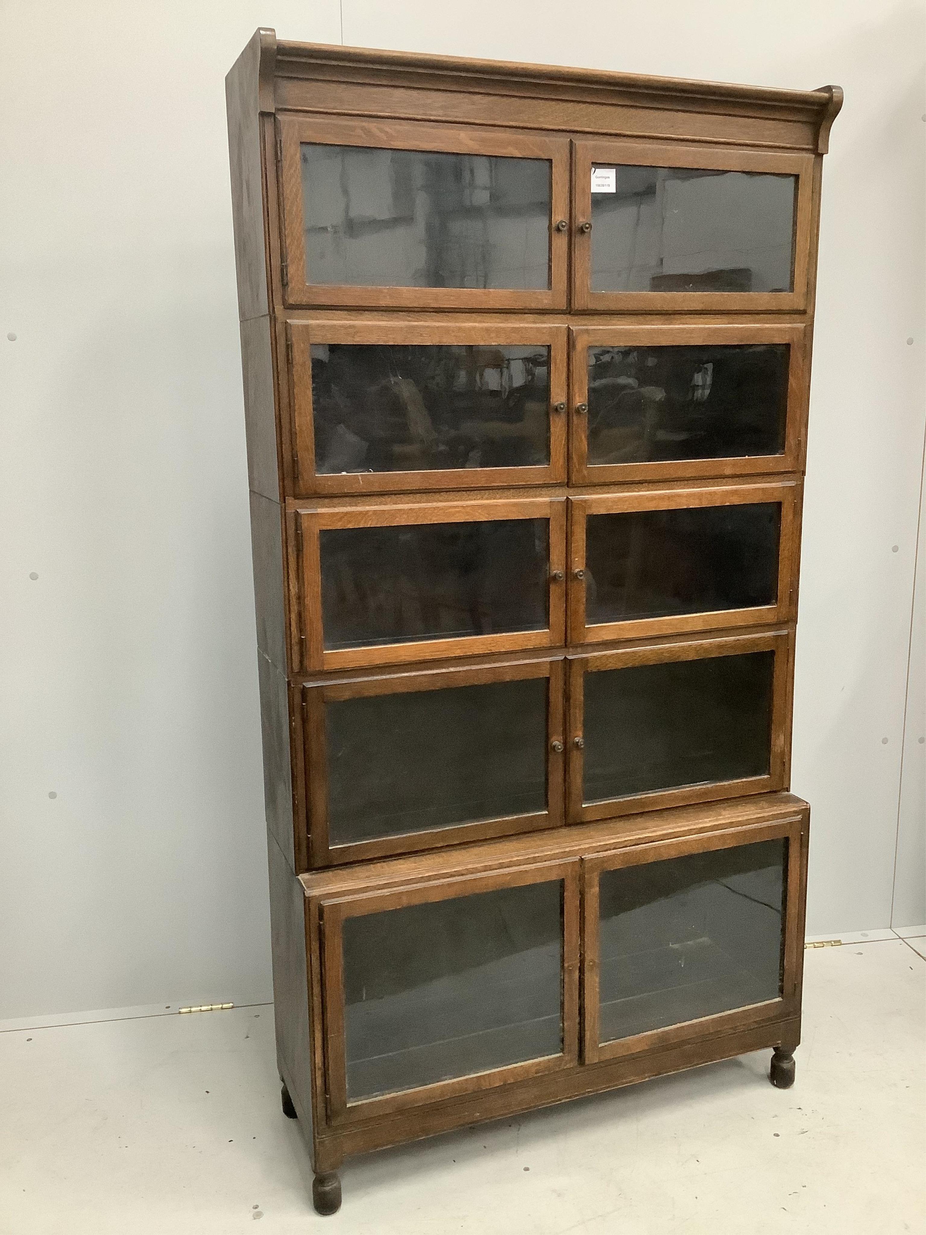 A Globe Wernicke style oak five section bookcase, width 89cm, depth 30cm, height 170cm. Condition - fair